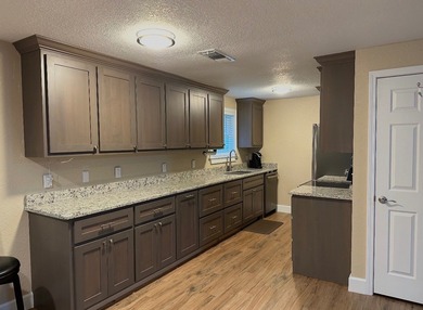 Beautiful 4-bedroom, 2-bath home located in Country Club Estates on Idabel Country Club in Oklahoma - for sale on GolfHomes.com, golf home, golf lot