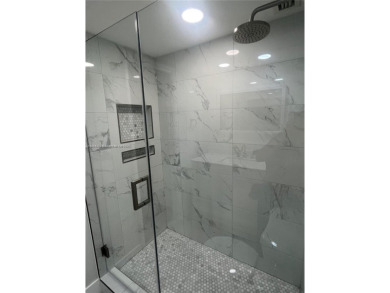 This beautifully remodeled 2-bedroom, 2-bath condo offers on Palm-Aire Country Club and Resort - Palms in Florida - for sale on GolfHomes.com, golf home, golf lot