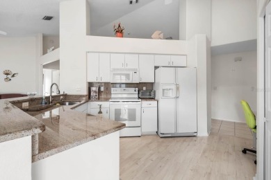 This rare UNATTACHED single-family-home-style condo is a on Falcon Watch Golf Club in Florida - for sale on GolfHomes.com, golf home, golf lot