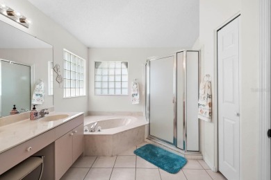 This rare UNATTACHED single-family-home-style condo is a on Falcon Watch Golf Club in Florida - for sale on GolfHomes.com, golf home, golf lot