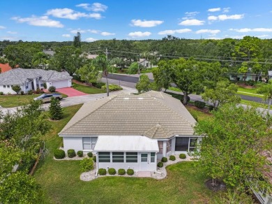 This rare UNATTACHED single-family-home-style condo is a on Falcon Watch Golf Club in Florida - for sale on GolfHomes.com, golf home, golf lot