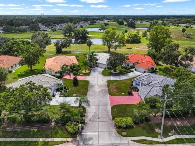 This rare UNATTACHED single-family-home-style condo is a on Falcon Watch Golf Club in Florida - for sale on GolfHomes.com, golf home, golf lot