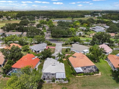 This rare UNATTACHED single-family-home-style condo is a on Falcon Watch Golf Club in Florida - for sale on GolfHomes.com, golf home, golf lot