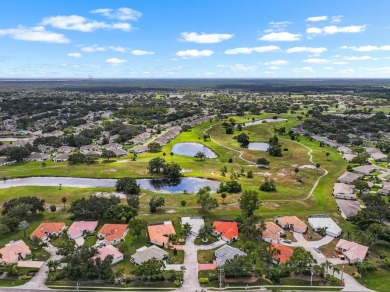 This rare UNATTACHED single-family-home-style condo is a on Falcon Watch Golf Club in Florida - for sale on GolfHomes.com, golf home, golf lot