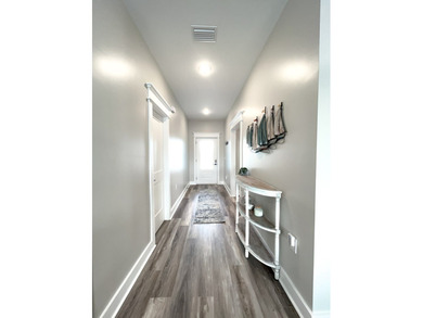 ?? Turnkey Income-Producing Beach Home - 402 California Dr on  in Florida - for sale on GolfHomes.com, golf home, golf lot