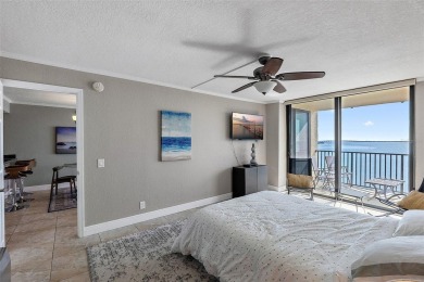Yes, that really is the view from this unit! Balmy bay breezes on Isla Del Sol Yacht and Country Club in Florida - for sale on GolfHomes.com, golf home, golf lot