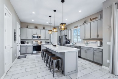 Looking for that absolutely STUNNING corner townhome with on Laughlin Ranch Golf Club in Arizona - for sale on GolfHomes.com, golf home, golf lot