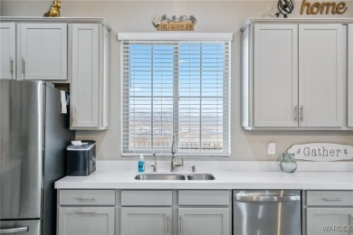 Looking for that absolutely STUNNING corner townhome with on Laughlin Ranch Golf Club in Arizona - for sale on GolfHomes.com, golf home, golf lot