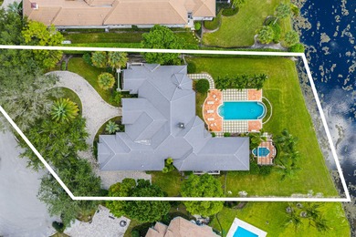 Perfectly situated on over 2/3 of an acre, this cul-de-sac on Old Marsh Golf Club in Florida - for sale on GolfHomes.com, golf home, golf lot