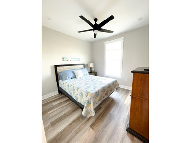 ?? Turnkey Income-Producing Beach Home - 402 California Dr on  in Florida - for sale on GolfHomes.com, golf home, golf lot