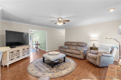 Welcome to this beautifully maintained brick ranch-style home on Baywood Golf Club in North Carolina - for sale on GolfHomes.com, golf home, golf lot