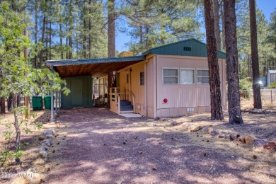 This newly remodeled, completely furnished home w/ lg AZ room on Bison Golf and Country Club in Arizona - for sale on GolfHomes.com, golf home, golf lot