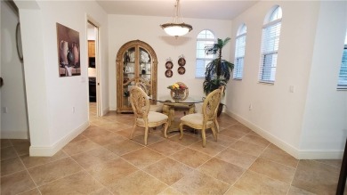 Absolutely stunning 3 bedroom 3 bath coach home overlooking the on The Rookery At Marco in Florida - for sale on GolfHomes.com, golf home, golf lot