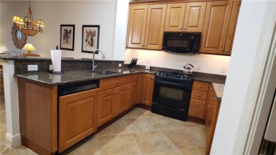 Absolutely stunning 3 bedroom 3 bath coach home overlooking the on The Rookery At Marco in Florida - for sale on GolfHomes.com, golf home, golf lot