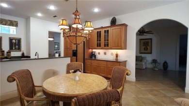 Absolutely stunning 3 bedroom 3 bath coach home overlooking the on The Rookery At Marco in Florida - for sale on GolfHomes.com, golf home, golf lot