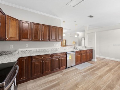 Welcome to this beautifully remodeled 3-bedroom, 2-bath home on Zellwood Station Country Club in Florida - for sale on GolfHomes.com, golf home, golf lot