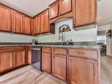 **This well-maintained home is MOVE IN READY!!** Nestled in a on The Highlands Course at Lake Arrowhead in Georgia - for sale on GolfHomes.com, golf home, golf lot
