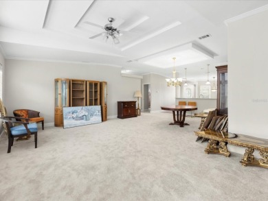 Welcome to this beautifully remodeled 3-bedroom, 2-bath home on Zellwood Station Country Club in Florida - for sale on GolfHomes.com, golf home, golf lot