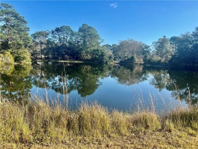 Established neighborhood in great location with water view! on Cypress Country Club and Golf Club  in Alabama - for sale on GolfHomes.com, golf home, golf lot