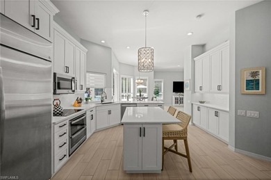 Beautifully positioned within the prestigious Gables at Pelican on Bay Colony Golf Club in Florida - for sale on GolfHomes.com, golf home, golf lot