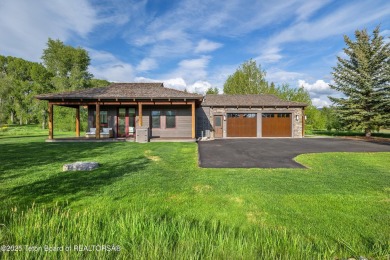Designed by renowned local architects Dubbe Moulder and on Jackson Hole Golf and Tennis Club in Wyoming - for sale on GolfHomes.com, golf home, golf lot