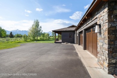 Designed by renowned local architects Dubbe Moulder and on Jackson Hole Golf and Tennis Club in Wyoming - for sale on GolfHomes.com, golf home, golf lot