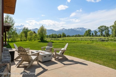 Designed by renowned local architects Dubbe Moulder and on Jackson Hole Golf and Tennis Club in Wyoming - for sale on GolfHomes.com, golf home, golf lot