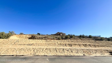 Spacious building lot located in the prestigious San Juan on San Juan Country Club in New Mexico - for sale on GolfHomes.com, golf home, golf lot