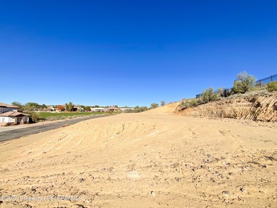 Spacious building lot located in the prestigious San Juan on San Juan Country Club in New Mexico - for sale on GolfHomes.com, golf home, golf lot