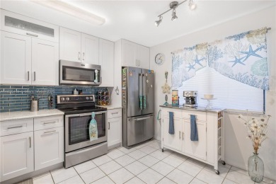 Welcome to your beautifully remodeled 2 bed, 2 bath on Pelican Pointe 9 Hole Course in Florida - for sale on GolfHomes.com, golf home, golf lot