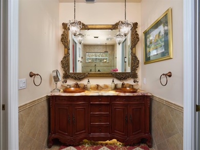 FULL HOUSE ACCORDION SHUTTERS, WHOLE HOUSE GENERATOR & NEWER on Ironhorse Country Club in Florida - for sale on GolfHomes.com, golf home, golf lot