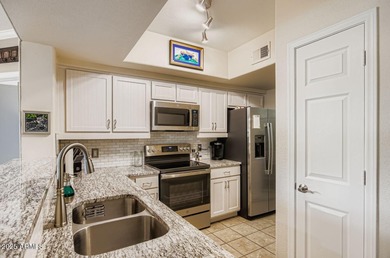 Discover this beautifully updated end-unit retreat in the highly on Sanctuary Golf Course At WestWorld in Arizona - for sale on GolfHomes.com, golf home, golf lot