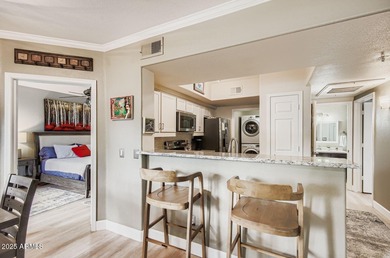 Discover this beautifully updated end-unit retreat in the highly on Sanctuary Golf Course At WestWorld in Arizona - for sale on GolfHomes.com, golf home, golf lot