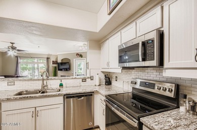 Discover this beautifully updated end-unit retreat in the highly on Sanctuary Golf Course At WestWorld in Arizona - for sale on GolfHomes.com, golf home, golf lot