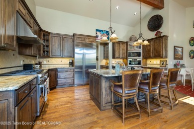 Located in the sought-after Jackson Hole Golf & Tennis community on Jackson Hole Golf and Tennis Club in Wyoming - for sale on GolfHomes.com, golf home, golf lot