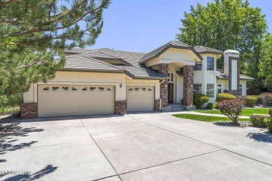 Tucked away on a quiet and prestigious cul-de-sac in the rolling on LakeRidge Golf Course in Nevada - for sale on GolfHomes.com, golf home, golf lot