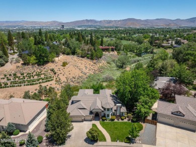 Tucked away on a quiet and prestigious cul-de-sac in the rolling on LakeRidge Golf Course in Nevada - for sale on GolfHomes.com, golf home, golf lot