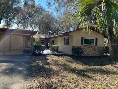 OPPORTUNITY AWAITS THIS SPACIOUS TOTALLY REMODELED 3 BEDROOM 2 on Chiefland Golf and Country Club in Florida - for sale on GolfHomes.com, golf home, golf lot
