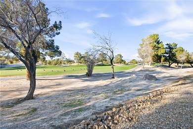 Set within Painted Desert, a guard-gated golf course community on Painted Desert Golf Club in Nevada - for sale on GolfHomes.com, golf home, golf lot