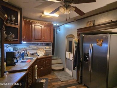 Welcome to coastal living at 120 Quarterdeck Street in North on North Shore Country Club in North Carolina - for sale on GolfHomes.com, golf home, golf lot