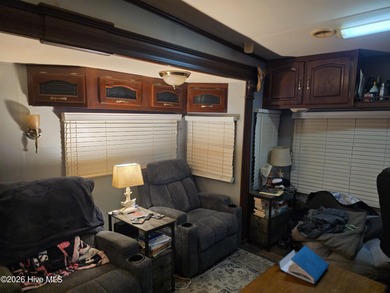 Welcome to coastal living at 120 Quarterdeck Street in North on North Shore Country Club in North Carolina - for sale on GolfHomes.com, golf home, golf lot