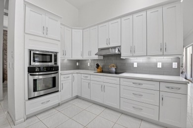 Welcome to 10791 River Glenn Dr, a stunning single-family home on Boca Woods Country Club in Florida - for sale on GolfHomes.com, golf home, golf lot