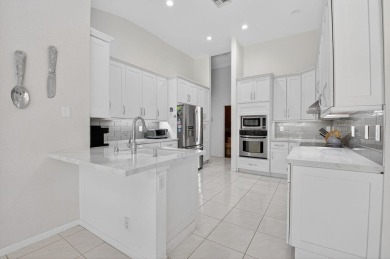 Welcome to 10791 River Glenn Dr, a stunning single-family home on Boca Woods Country Club in Florida - for sale on GolfHomes.com, golf home, golf lot
