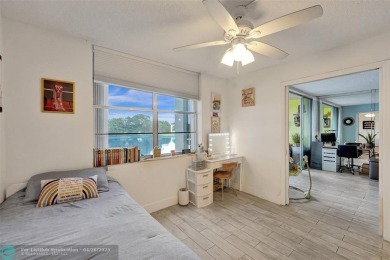 Beautiful condo in Pine Island Ridge's Poinciana community with on Pine Island Ridge Country Club in Florida - for sale on GolfHomes.com, golf home, golf lot
