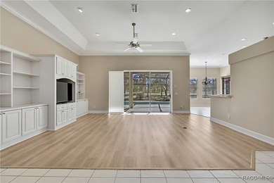 Beautifully upgraded home with 4 bedrooms, 2.5 baths and a 3 car on Southern Woods Golf Club in Florida - for sale on GolfHomes.com, golf home, golf lot