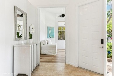 TREMENDOUS OPPORTUNITY FOR THIS COZY 2BR+DEN, 2 BA VILLA on Ibis Golf and Country Club in Florida - for sale on GolfHomes.com, golf home, golf lot