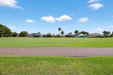 Welcome to 10791 River Glenn Dr, a stunning single-family home on Boca Woods Country Club in Florida - for sale on GolfHomes.com, golf home, golf lot