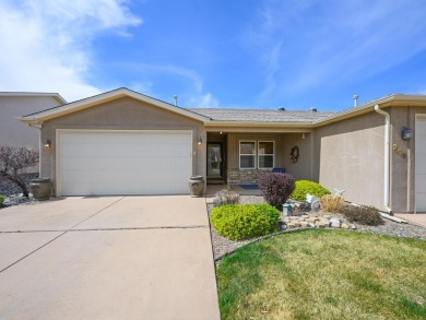 Wonderful lock & leave townhome in Chipeta Pines. Large open on Chipeta Golf Course At Orchard Mesa in Colorado - for sale on GolfHomes.com, golf home, golf lot