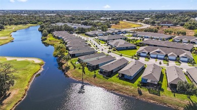 Wait until you see this FABULOUS WATERFRONT HOME overlooking the on Freedom Fairways in Florida - for sale on GolfHomes.com, golf home, golf lot
