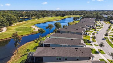 Wait until you see this FABULOUS WATERFRONT HOME overlooking the on Freedom Fairways in Florida - for sale on GolfHomes.com, golf home, golf lot